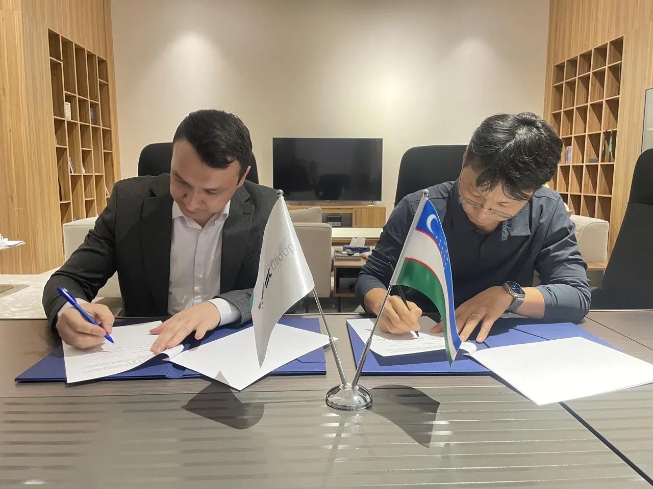 UIC Software portfolio presentation covering fintech healthcare and AI systems in Uzbekistan