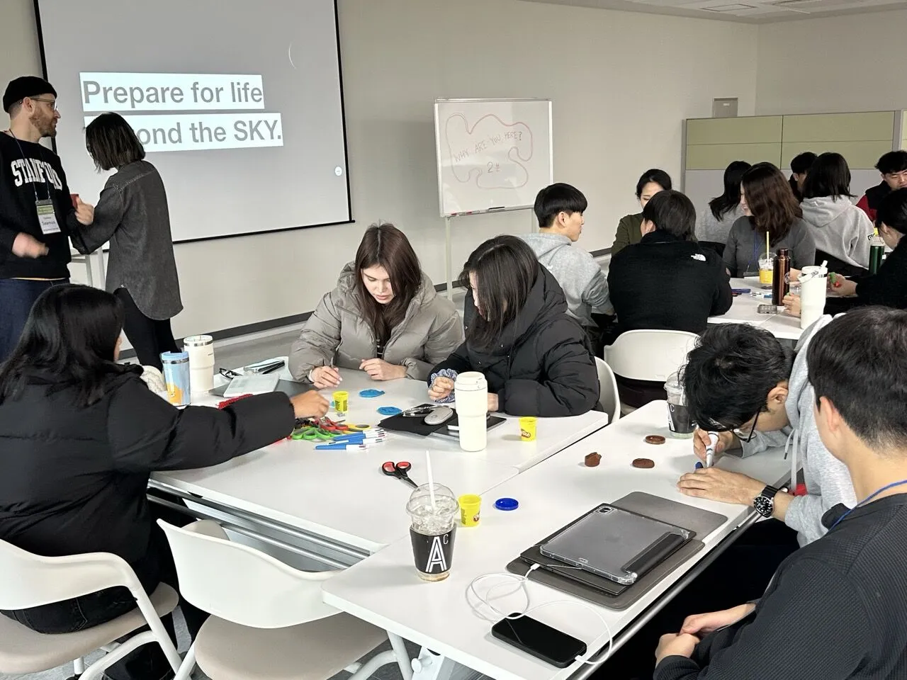 Students engaging in Stanford d.school design thinking workshop at Jeju RISE Space Bootcamp