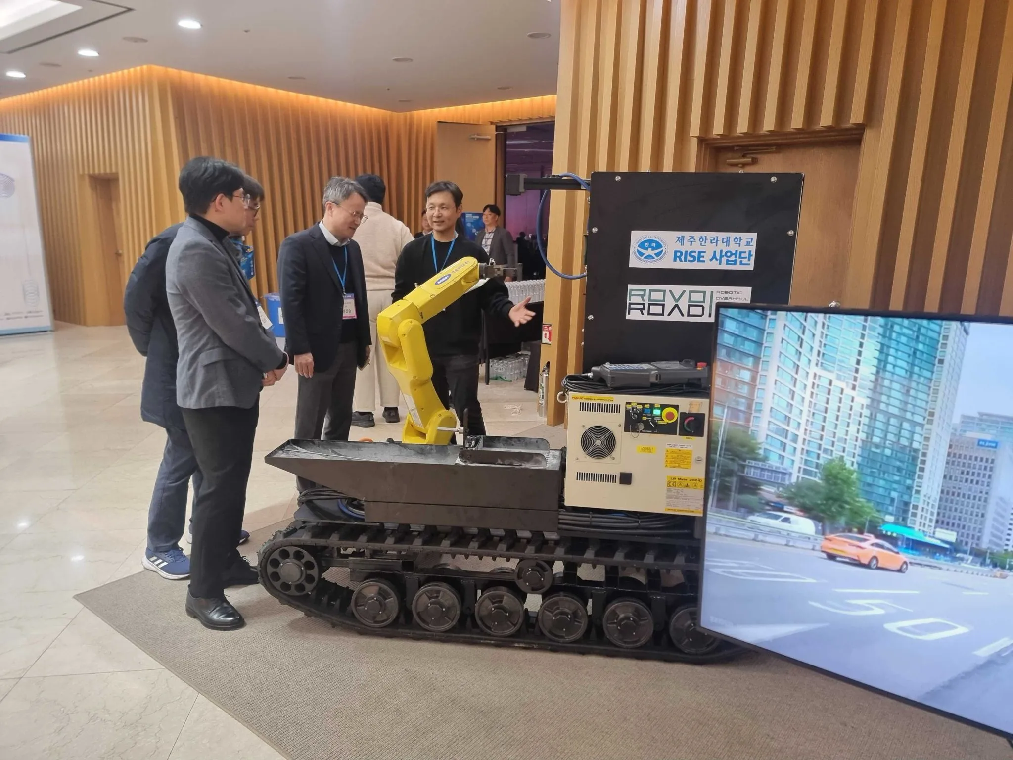 RovoRoad first-generation automated road repair robot prototype demonstrated at RISE conference