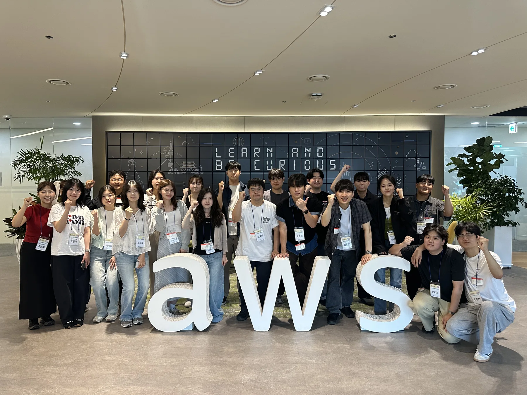 Students and staff from the Jeju RISE-AWS Global Space Bootcamp cohort taking a group photo at the AWS Seoul office